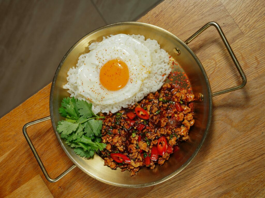 Top View of Meat and Egg in Pan